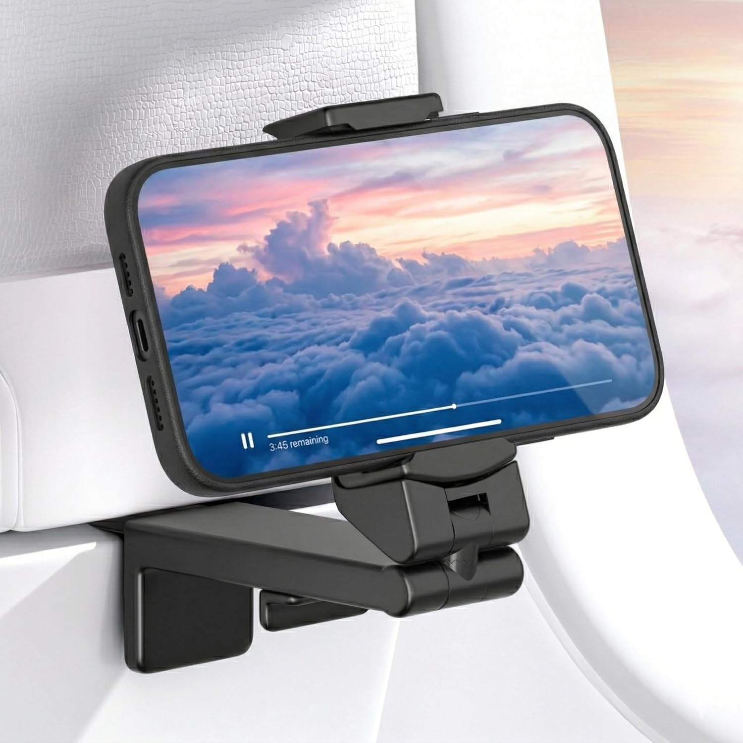 Perilogics universal airplane phone holder clipped onto a tray table holding a smartphone at eye level